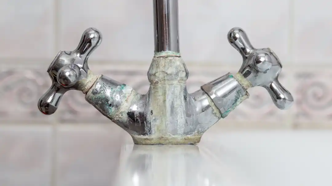 Limescale buildup from hard tap water, unsuitable for coffee brewing