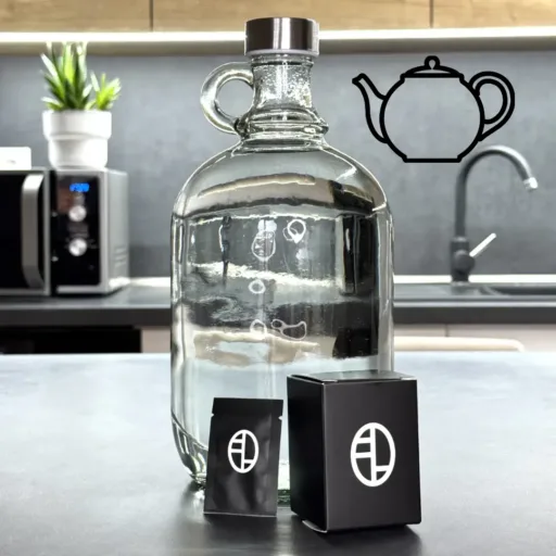 Tea brewing water mineral mix beside a jug, perfect for enhancing green tea, oolong, or black tea flavour clarity