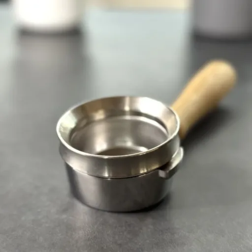 Elevated dosing ring on portafilter for mess-free coffee prep