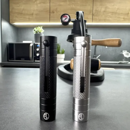 Espresso WDT tools with sliding needle mechanism in black and silver colors